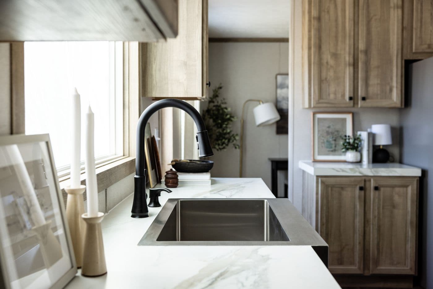 The STERLING ANNIVERSARY Kitchen. This Manufactured Mobile Home features 3 bedrooms and 2 baths.