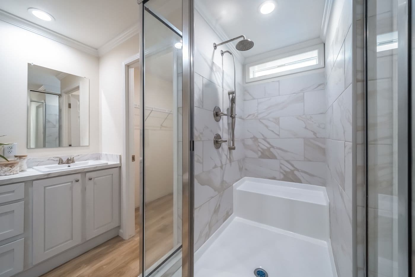 The 5430 "UWHARRIE" 7632 Primary Bathroom. This Manufactured Mobile Home features 4 bedrooms and 2 baths.