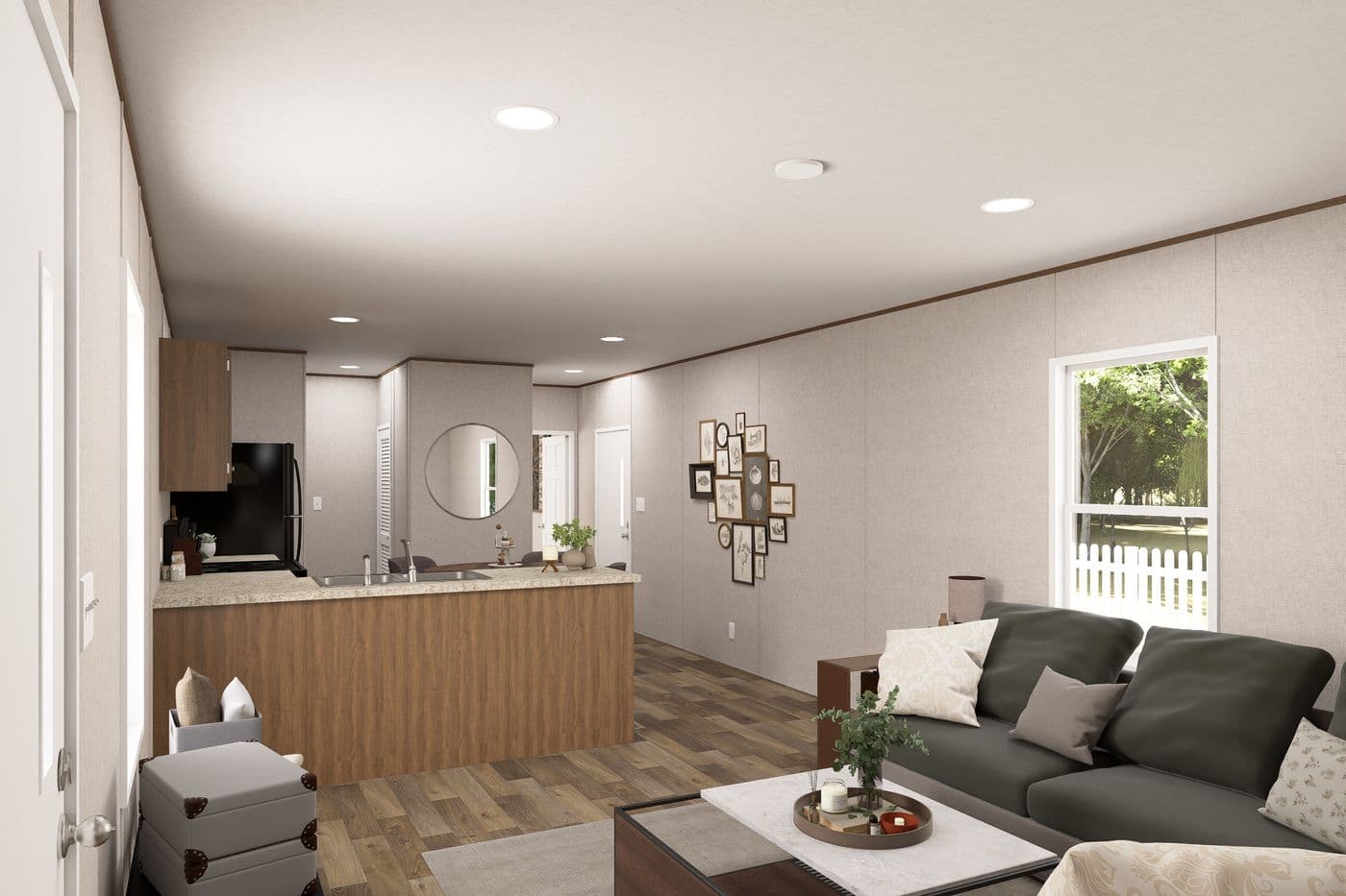 The CYPRESS Living Room. This Manufactured Mobile Home features 4 bedrooms and 2 baths.