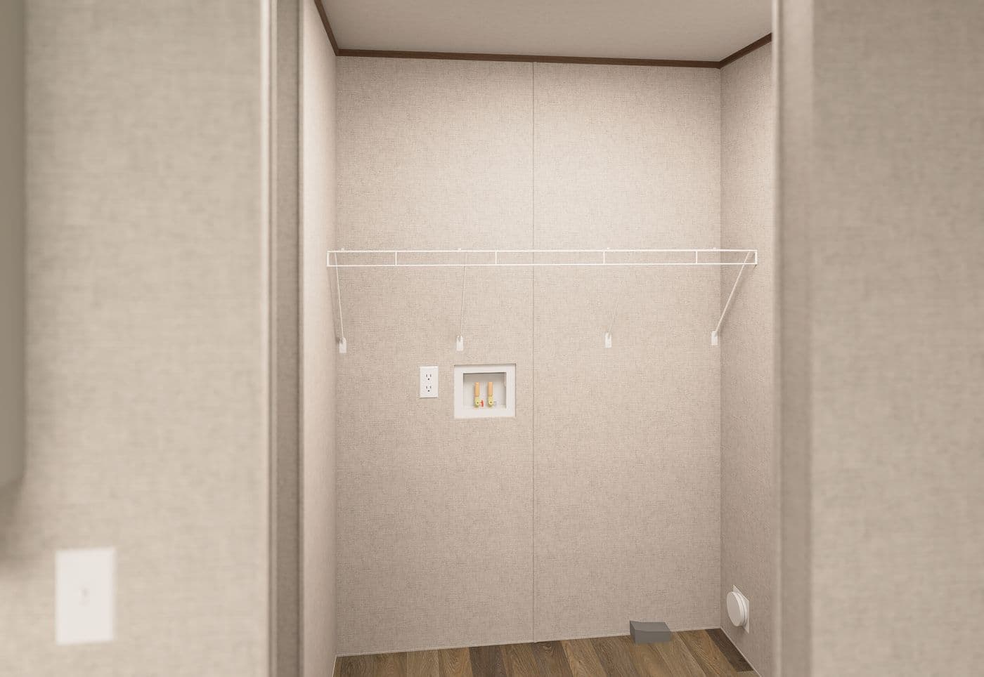 The CEDAR Utility Room. This Manufactured Mobile Home features 3 bedrooms and 2 baths.
