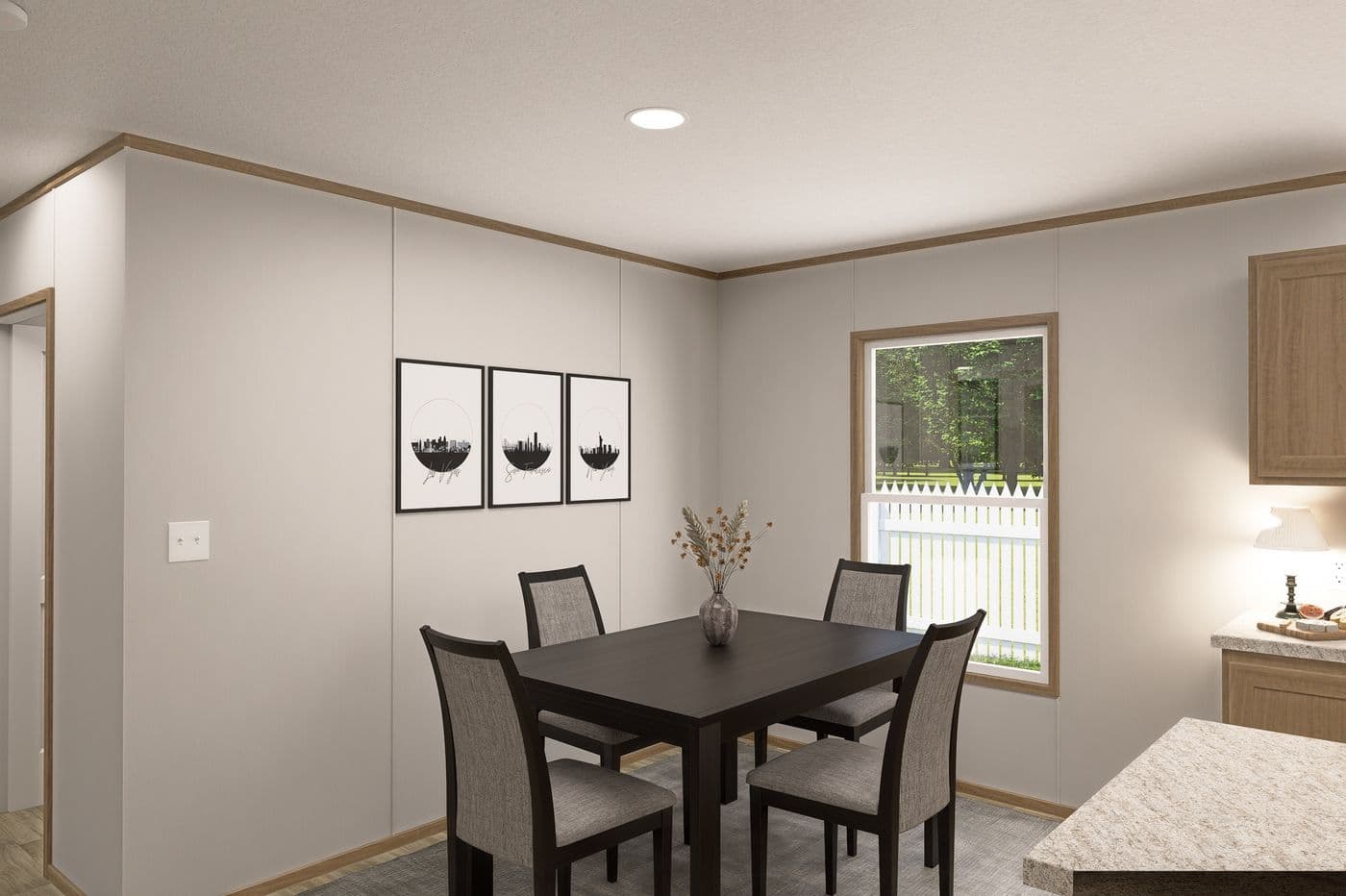 The THE EAGLE 60 Dining Room. This Manufactured Mobile Home features 3 bedrooms and 2 baths.