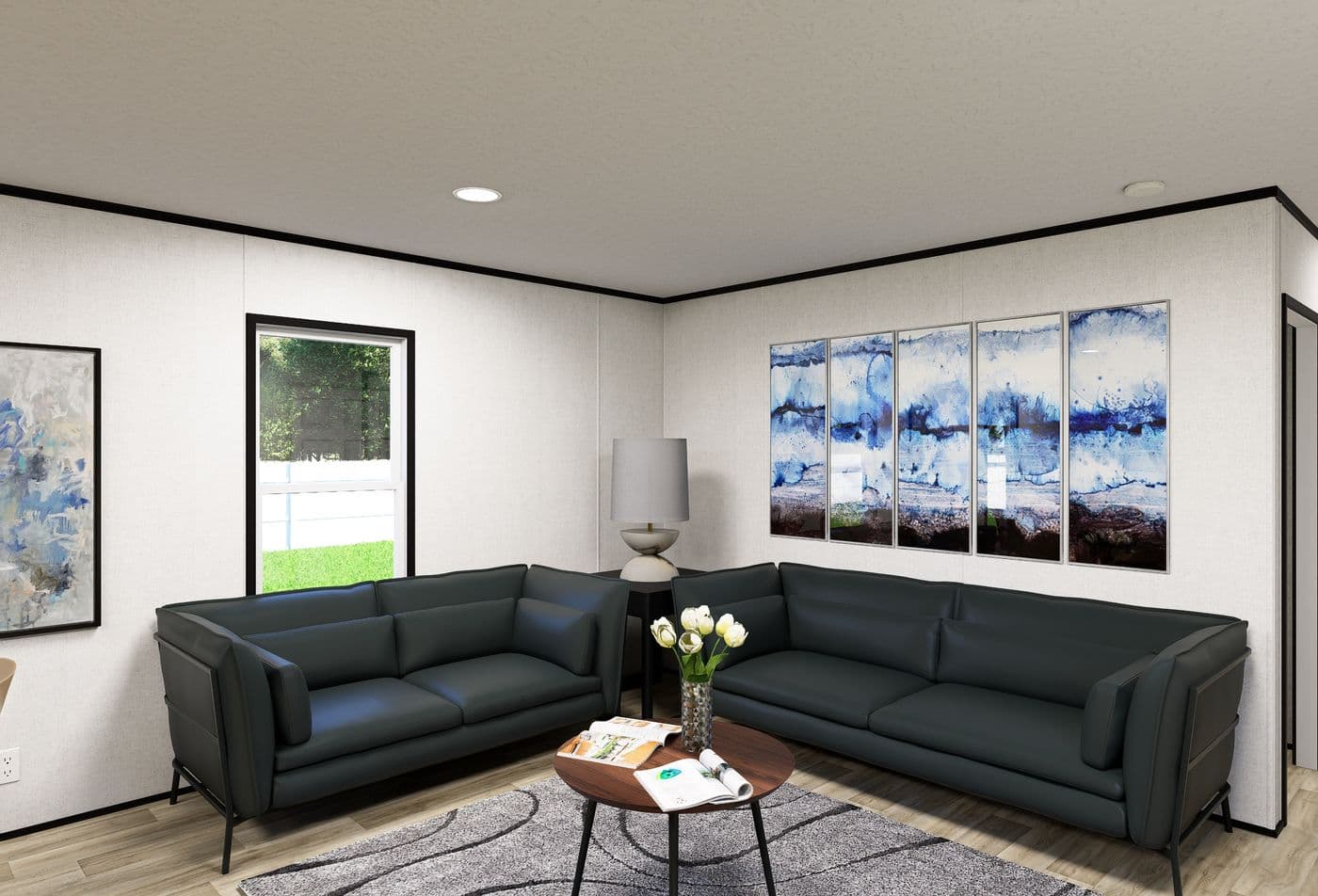 The OASIS Living Room. This Manufactured Mobile Home features 3 bedrooms and 2 baths.