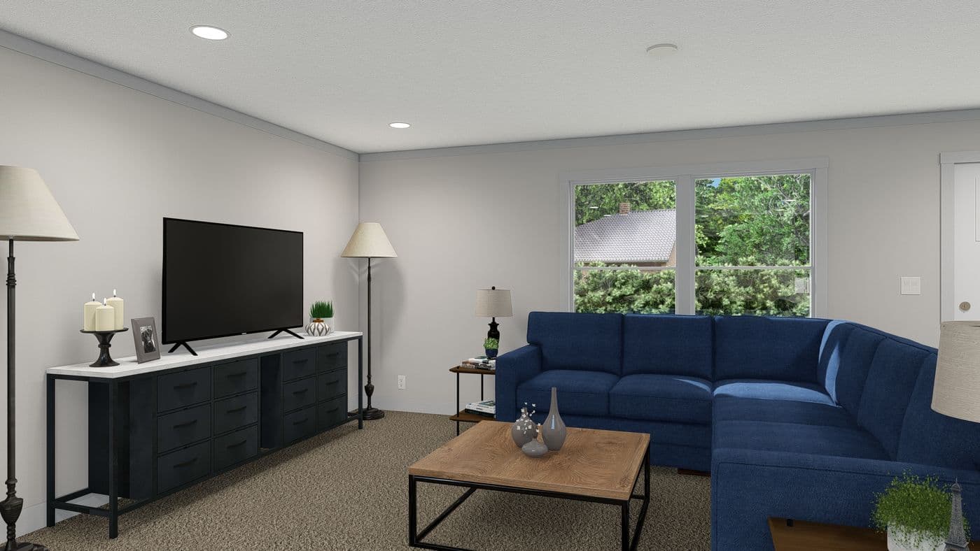 The 2003 "ROCKET MAN" 6628 Living Room. This Manufactured Mobile Home features 3 bedrooms and 2 baths.
