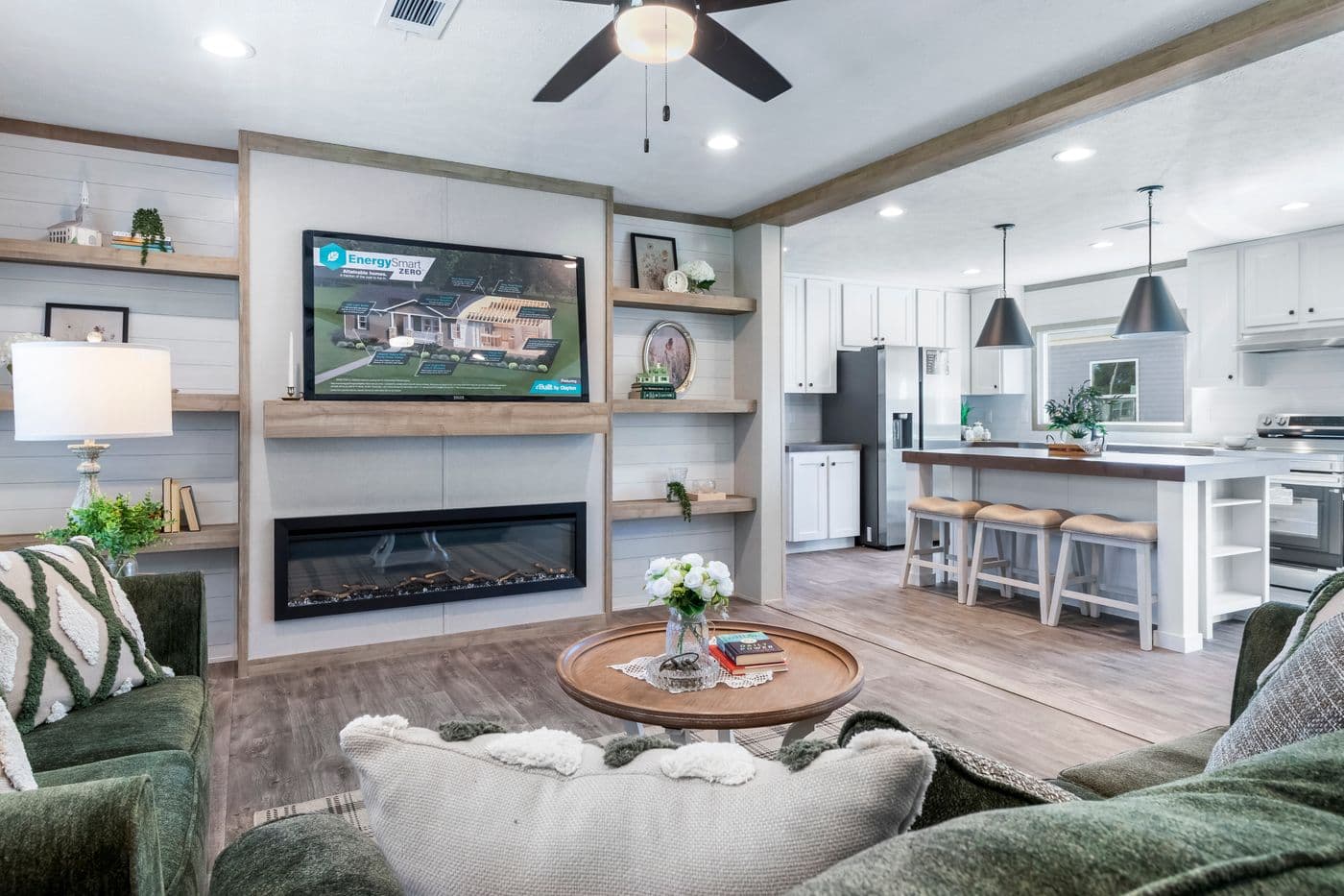 The THE BIG DEAL 52 Living Room. This Manufactured Mobile Home features 3 bedrooms and 2 baths.