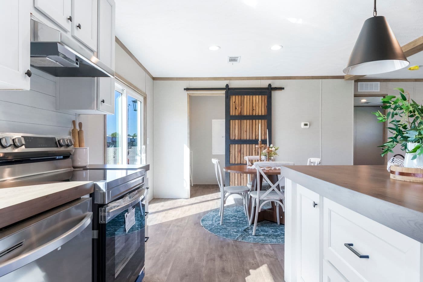 The THE BIG DEAL 52 Kitchen. This Manufactured Mobile Home features 3 bedrooms and 2 baths.