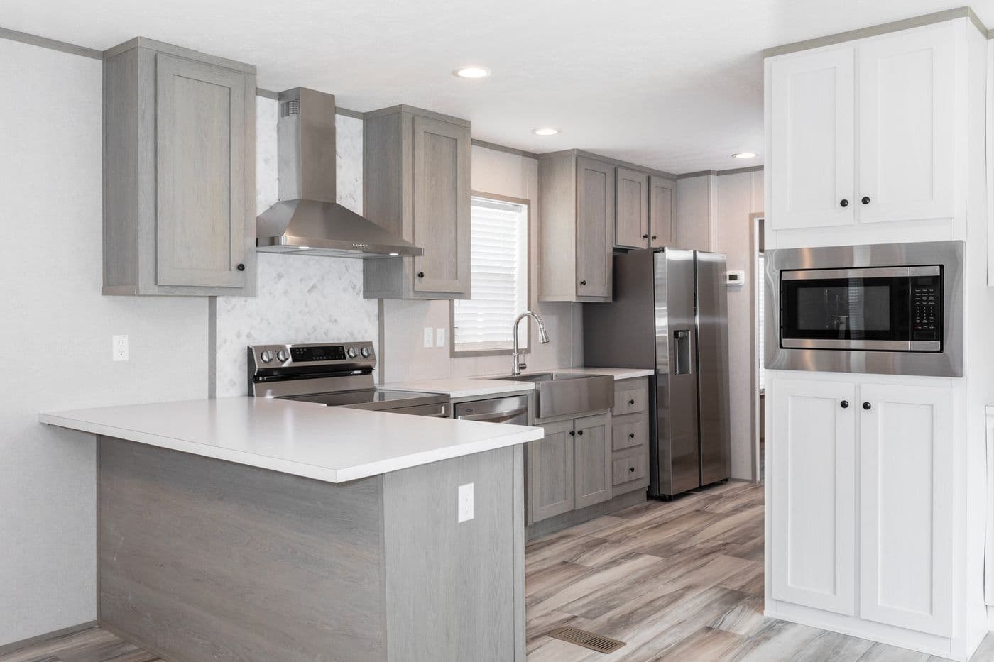 The THE OLYMPUS Kitchen. This Manufactured Mobile Home features 3 bedrooms and 2 baths.