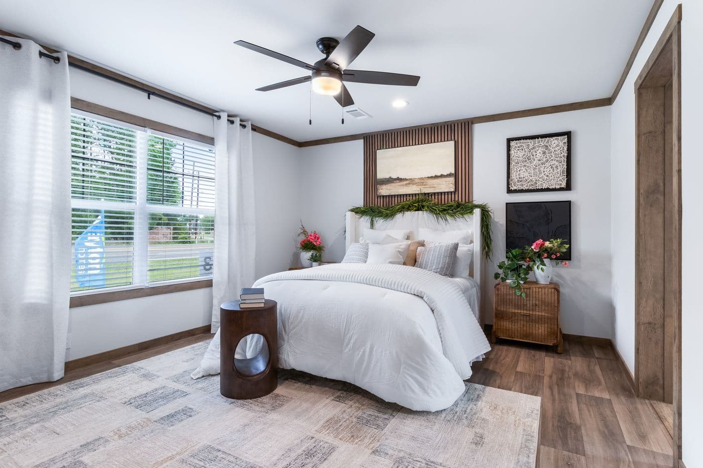 The FARM 3 FLEX Primary Bedroom. This Manufactured Mobile Home features 3 bedrooms and 2 baths.