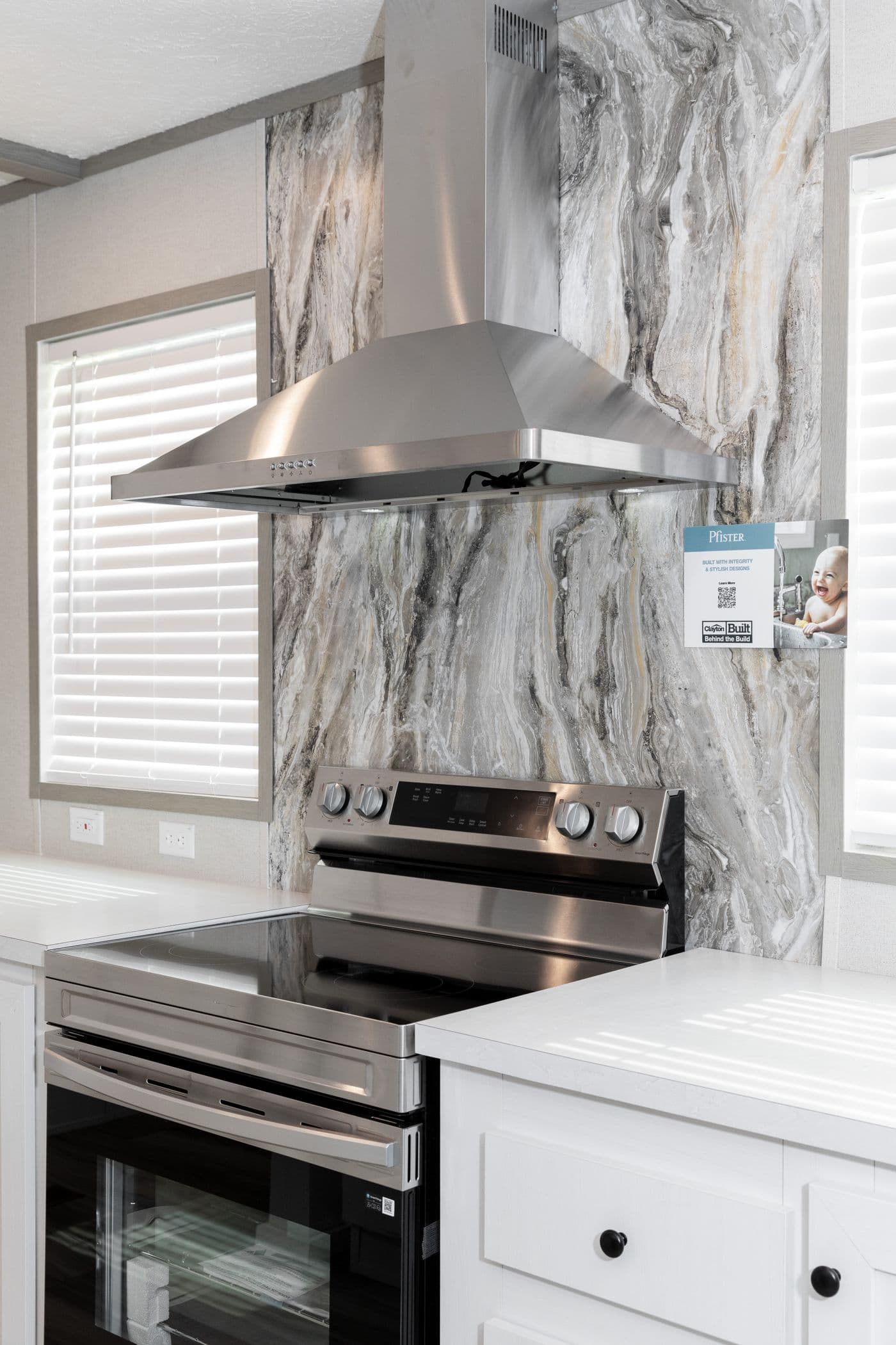 The PLATINUM ANNIVERSARY Kitchen. This Manufactured Mobile Home features 3 bedrooms and 2 baths.