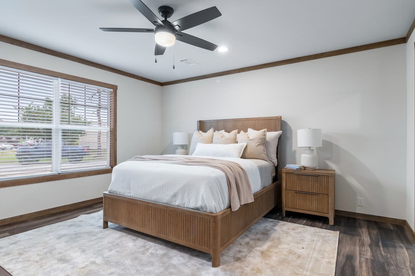 The EVERETT ELITE Primary Bedroom. This Manufactured Mobile Home features 4 bedrooms and 3 baths.