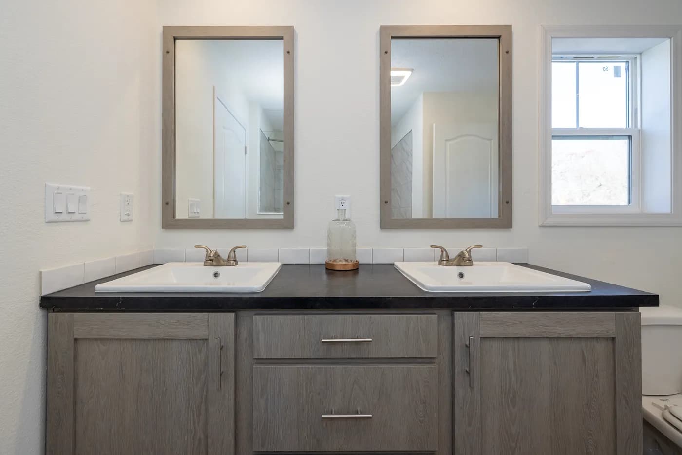 The ROOSEVELT MOD Primary Bathroom. This Modular Home features 3 bedrooms and 2 baths.