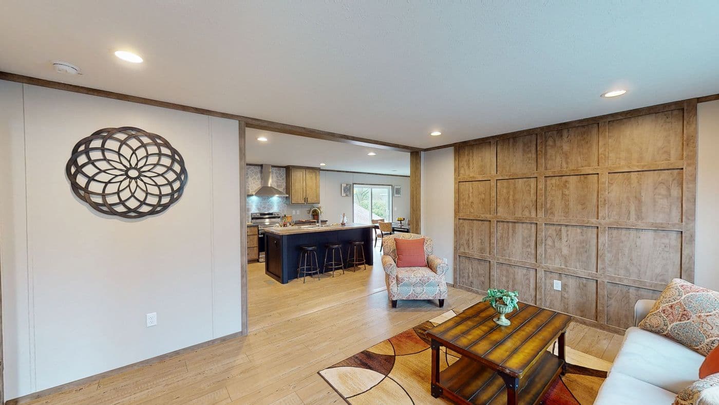 The BOONE Living Room. This Manufactured Mobile Home features 4 bedrooms and 2 baths.