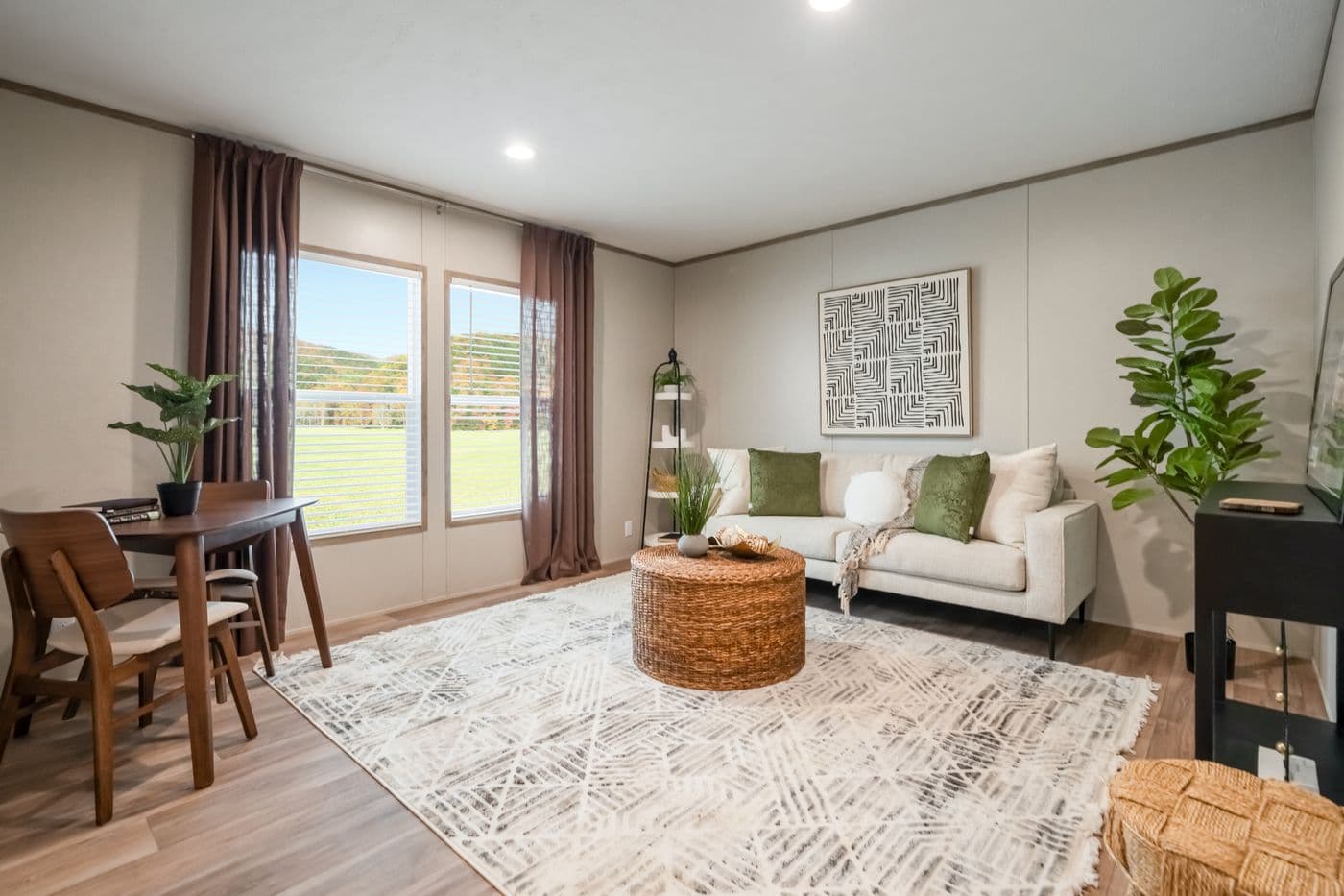 The ECLIPSE Sitting Room. This Manufactured Mobile Home features 4 bedrooms and 2 baths.