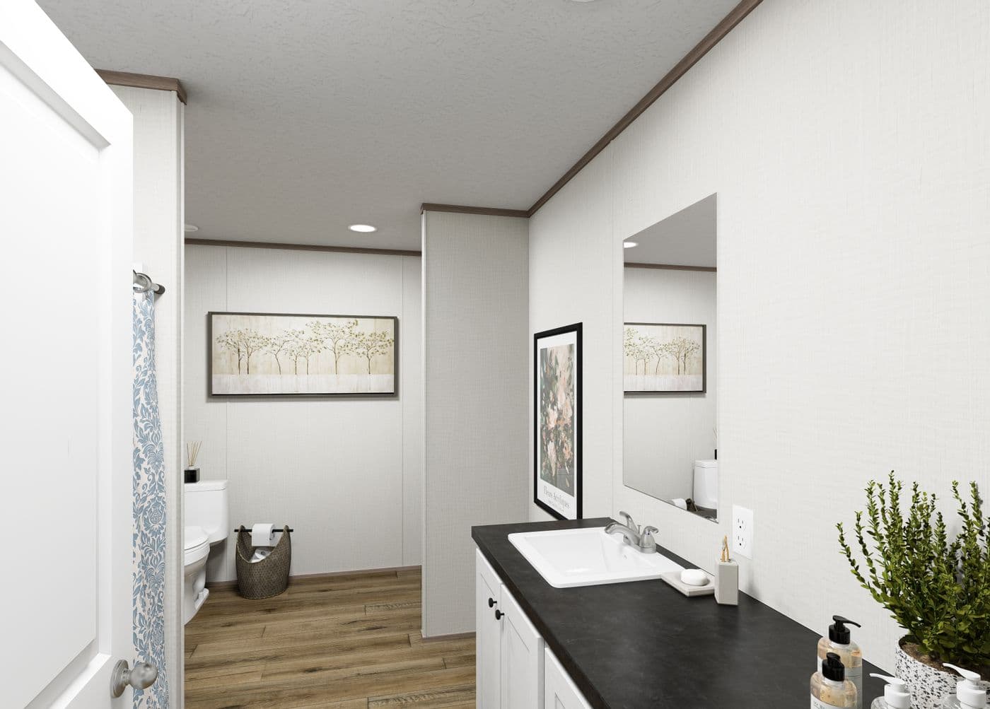 The ASPIRE Primary Bathroom. This Manufactured Mobile Home features 3 bedrooms and 2 baths.