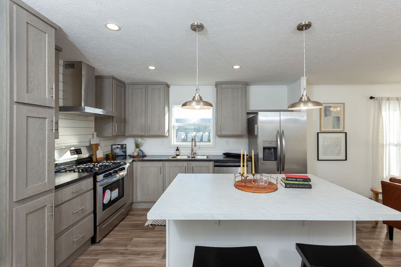 The LIFESTYLE 208 Kitchen. This Manufactured Mobile Home features 3 bedrooms and 2 baths.