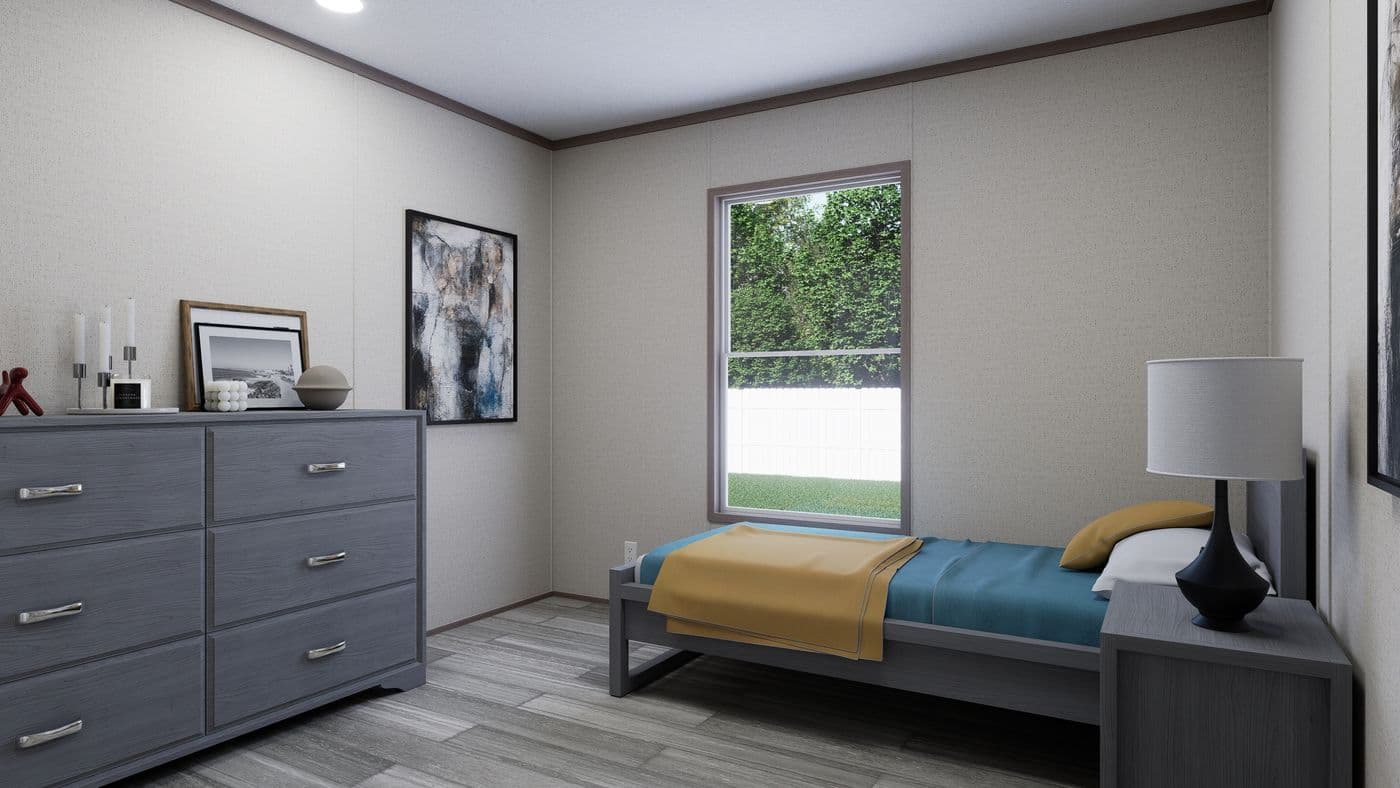 The THE MOUNTAINEER 60 Bedroom. This Manufactured Mobile Home features 3 bedrooms and 2 baths.