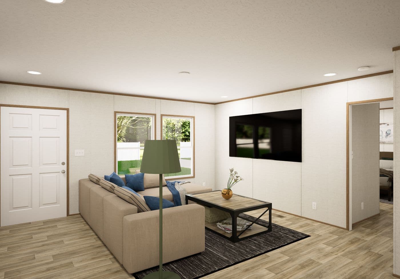 The GROVE Living Room. This Manufactured Mobile Home features 3 bedrooms and 2 baths.