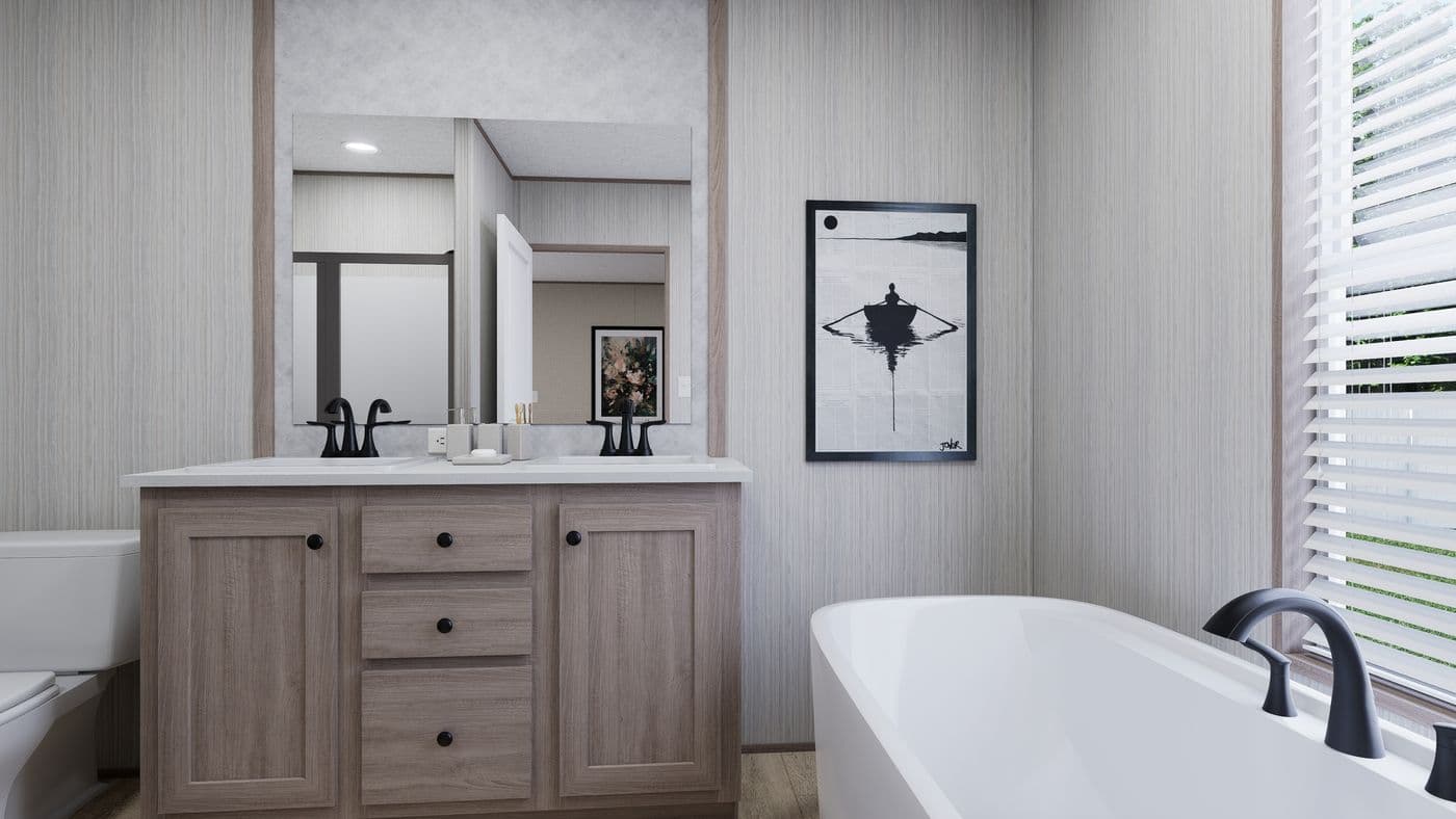 The THE ANNIVERSARY 76 Primary Bathroom. This Manufactured Mobile Home features 3 bedrooms and 2 baths.