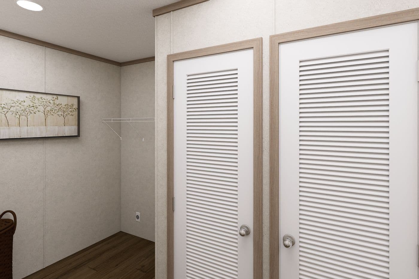 The 7616-CC01 CORNERSTONE 76 Utility Room. This Manufactured Mobile Home features 3 bedrooms and 2 baths.