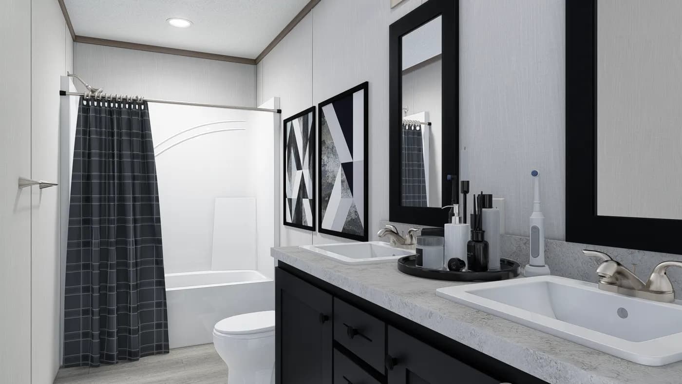 The 4028-E751 THE PULSE Primary Bathroom. This Manufactured Mobile Home features 3 bedrooms and 2 baths.