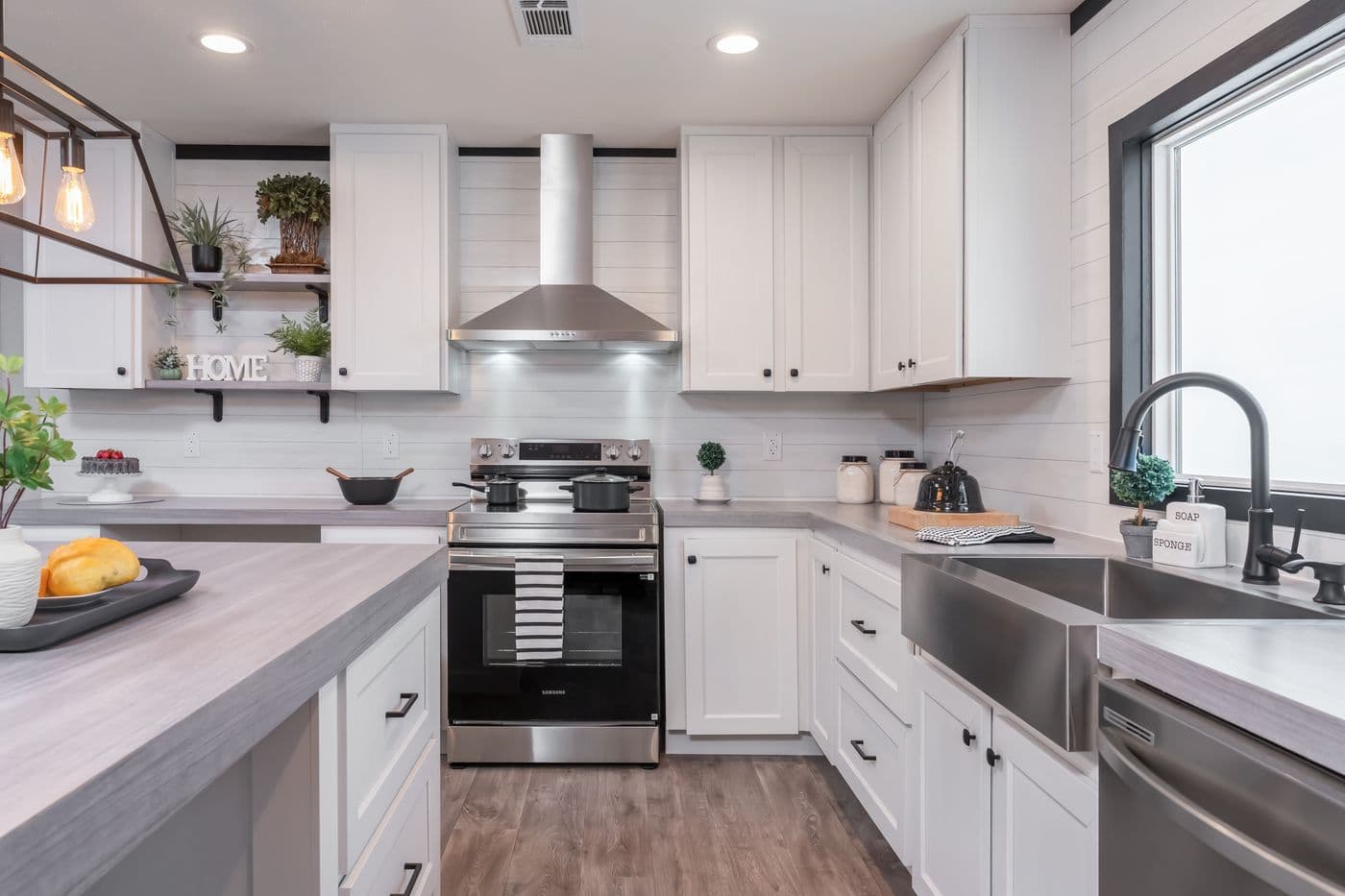 The BREEZE FARMHOUSE Kitchen. This Manufactured Mobile Home features 3 bedrooms and 2 baths.