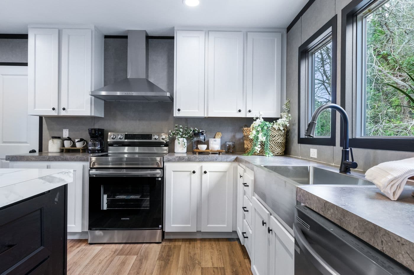 The ABSOLUTE VALUE Kitchen. This Manufactured Mobile Home features 4 bedrooms and 2 baths.