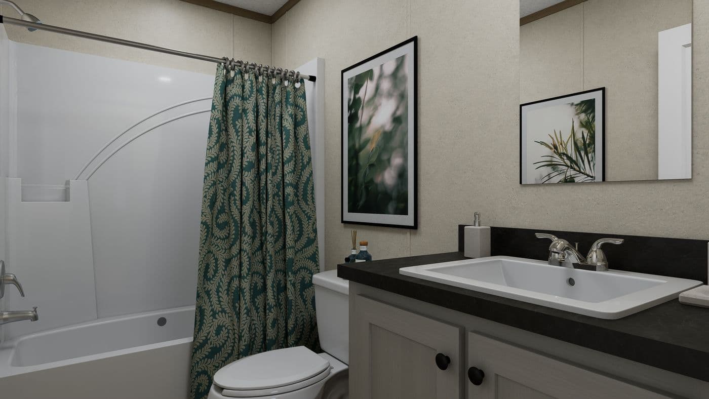 The 4828-CC51 PILLAR 48 Guest Bathroom. This Manufactured Mobile Home features 3 bedrooms and 2 baths.
