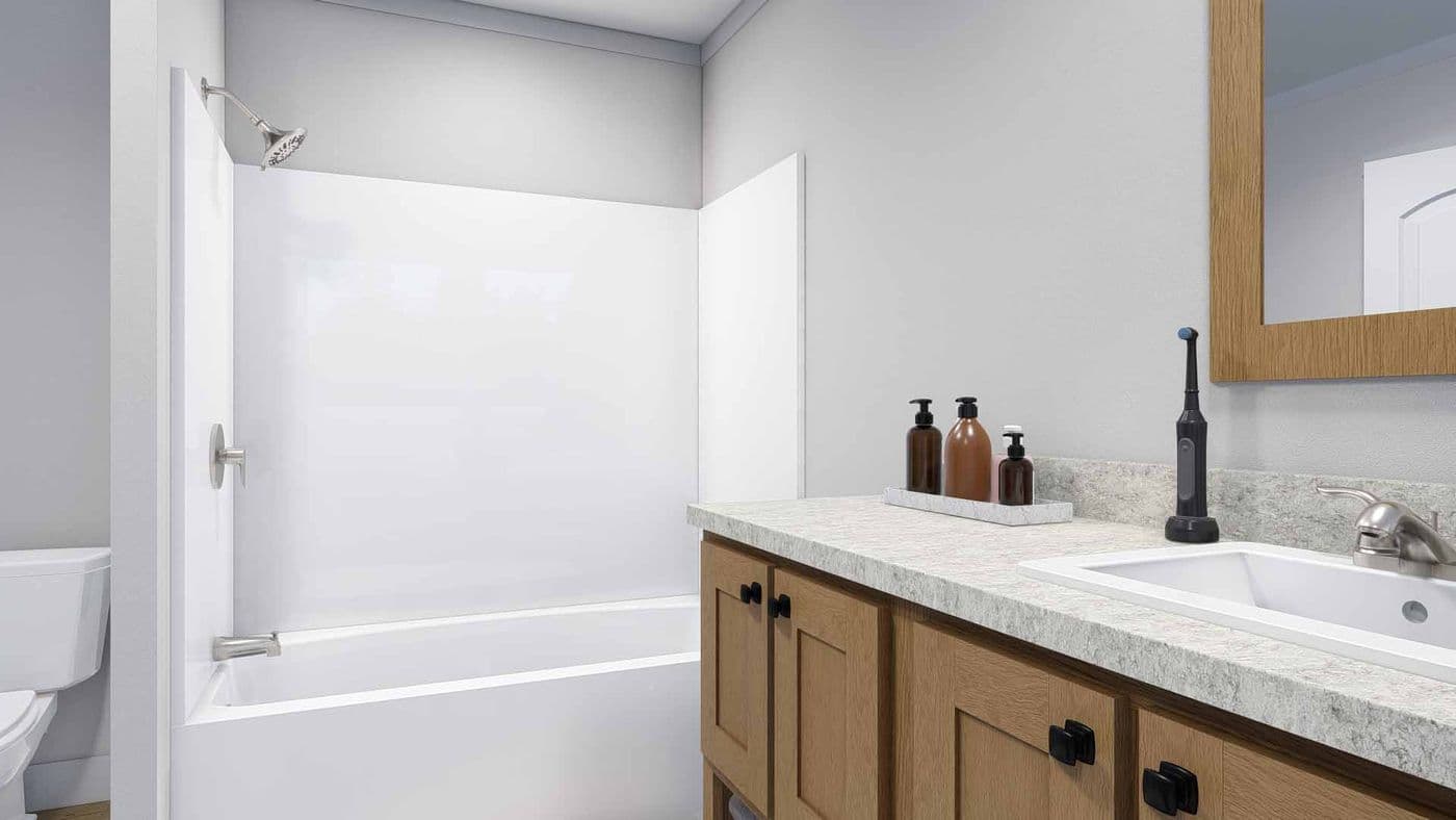 The YELLOW SUBMARINE Guest Bathroom. This Manufactured Mobile Home features 5 bedrooms and 2 baths.