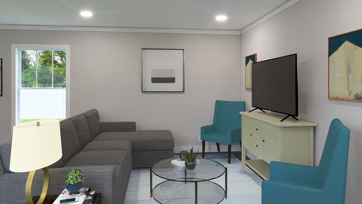 The BORN TO RUN Living Room. This Manufactured Mobile Home features 2 bedrooms and 2 baths.