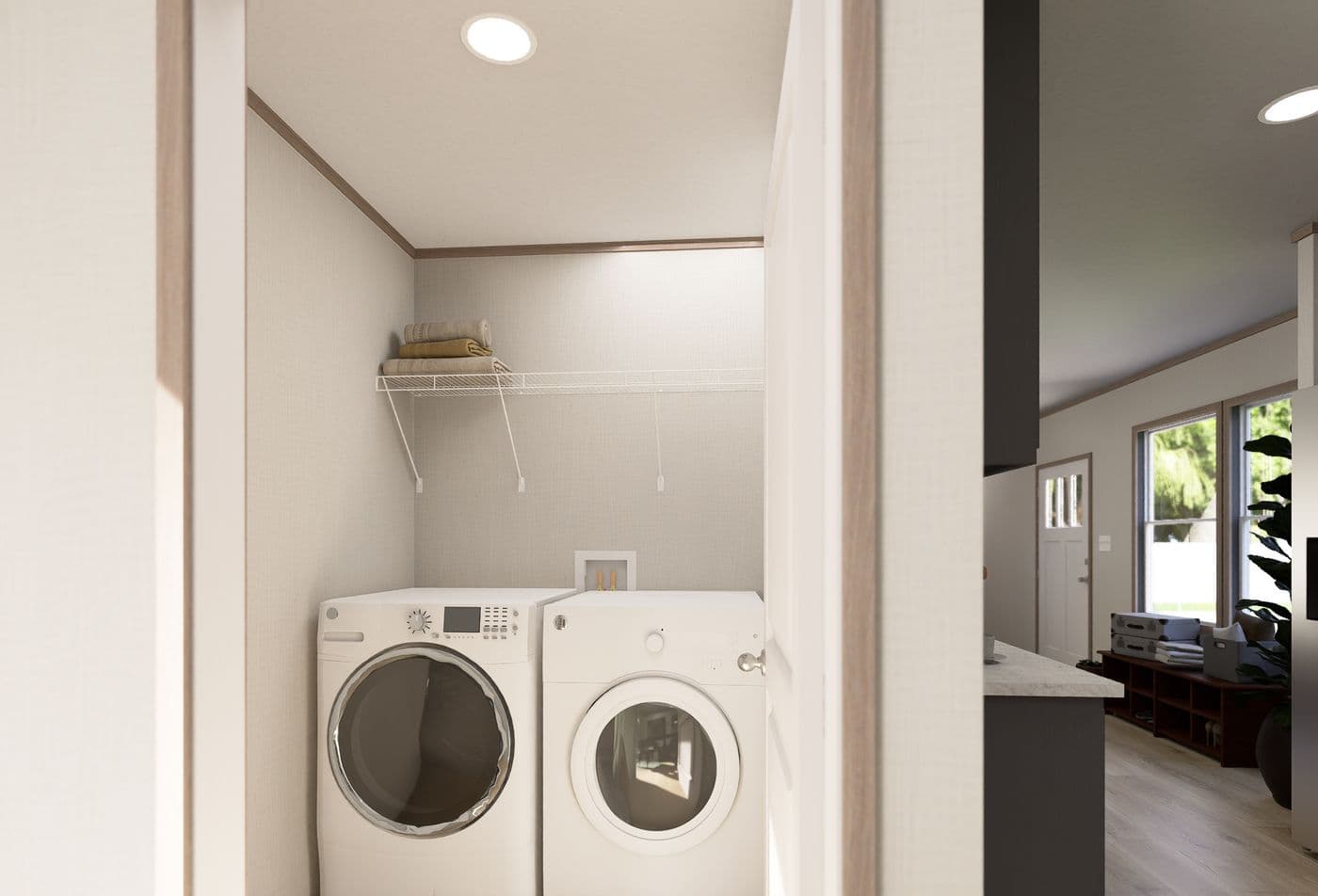 The ULTRA FLEX ANNIVERSARY PLUS Utility Room. This Manufactured Mobile Home features 3 bedrooms and 2 baths.