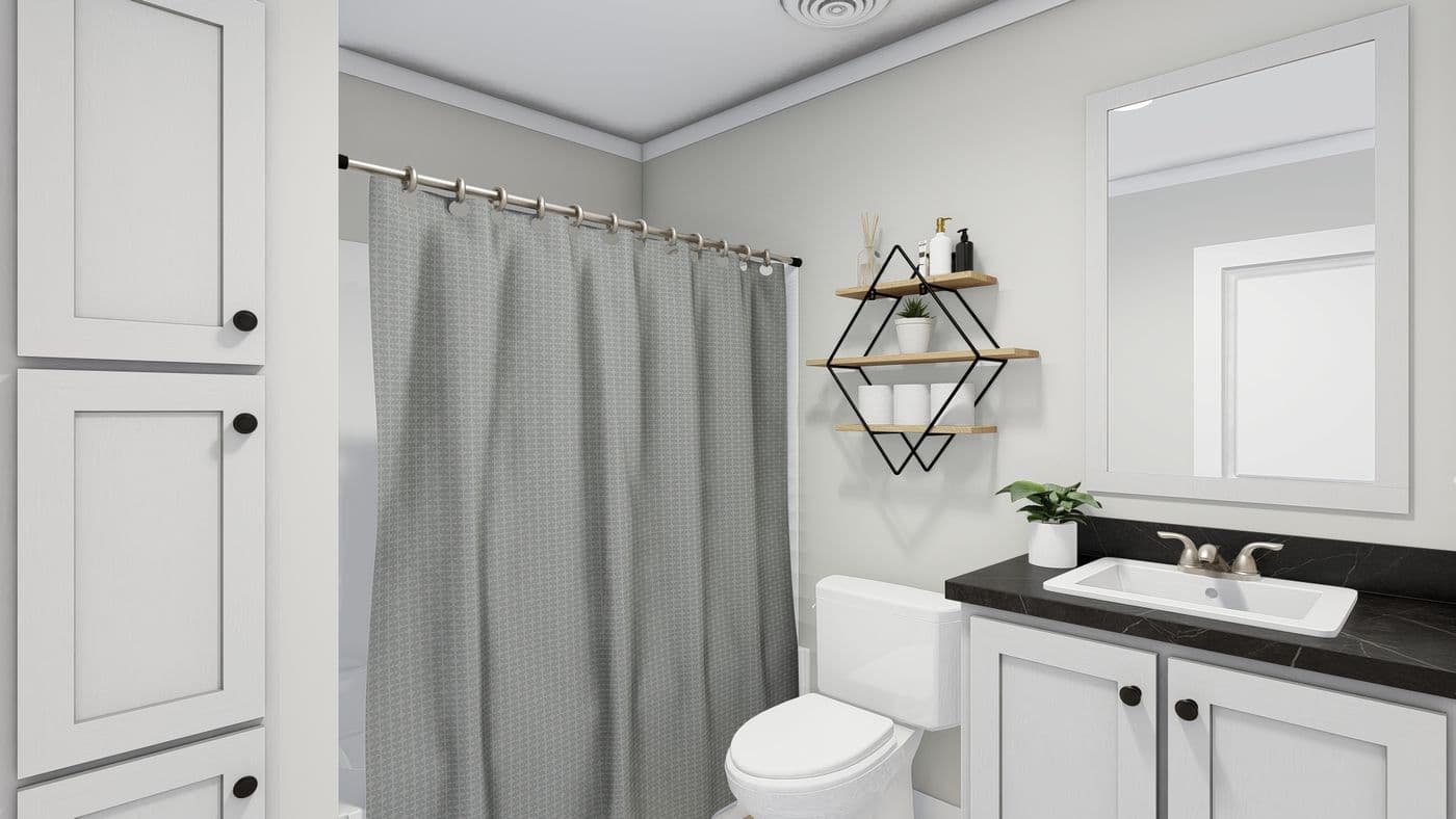 The TUCSON Guest Bathroom. This Manufactured Mobile Home features 3 bedrooms and 2 baths.