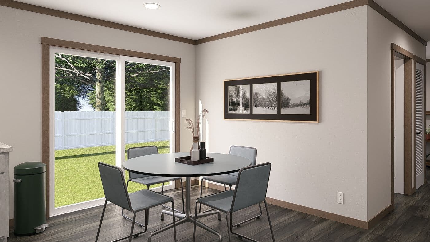 The WILDER Dining Room. This Manufactured Mobile Home features 3 bedrooms and 2 baths.