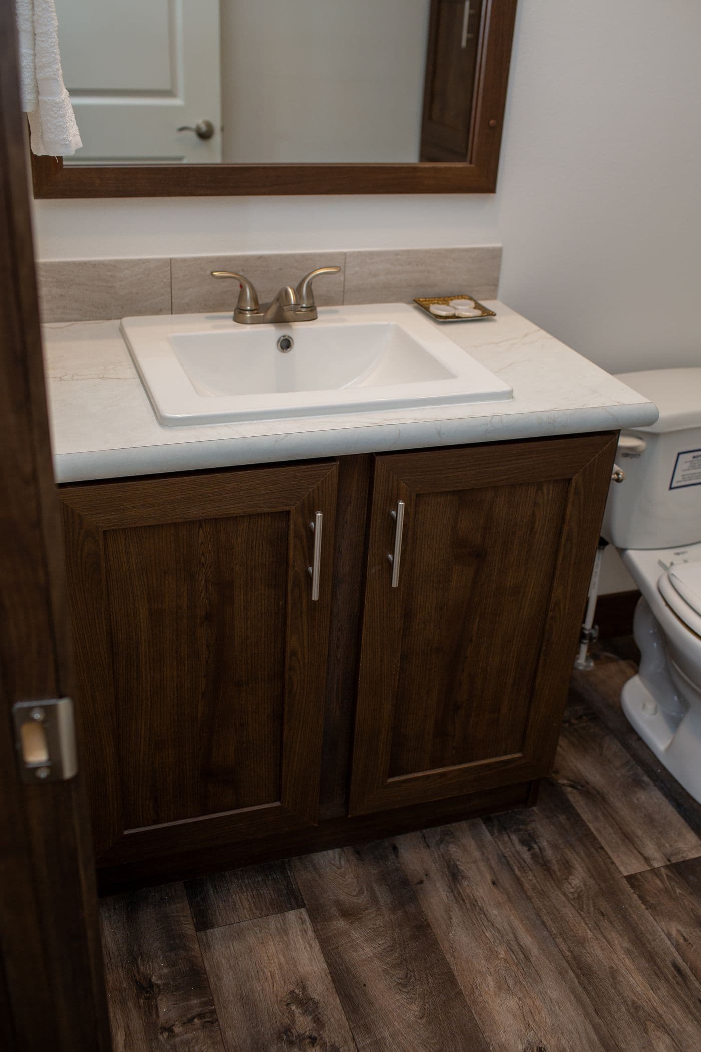 The RAMSEY 75 MOD Guest Bathroom. This Modular Home features 4 bedrooms and 2 baths.