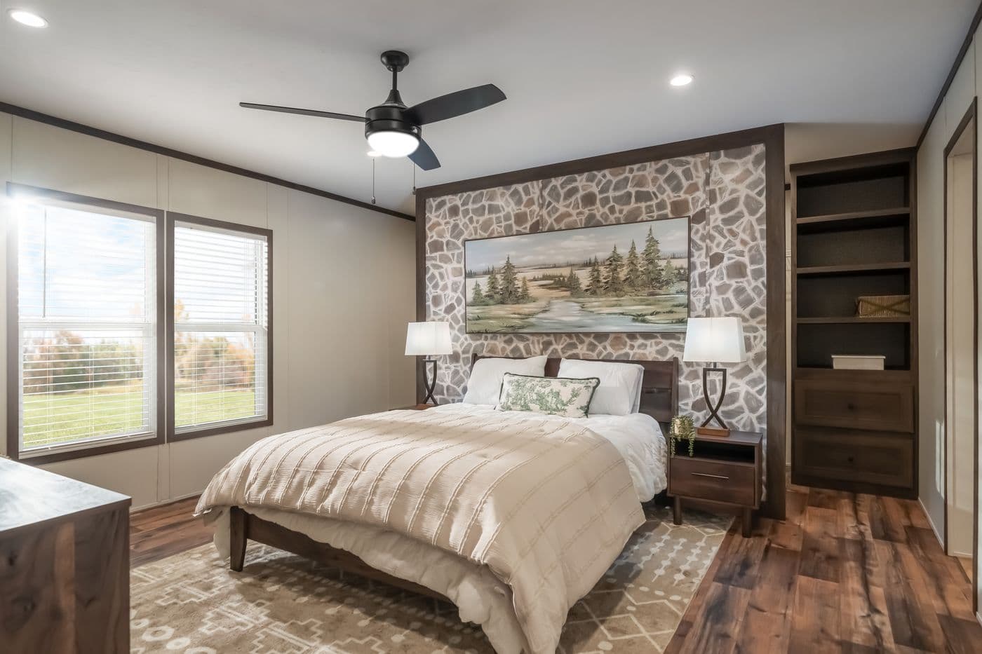 The MOUNTAIN VIEW Primary Bedroom. This Manufactured Mobile Home features 3 bedrooms and 2 baths.