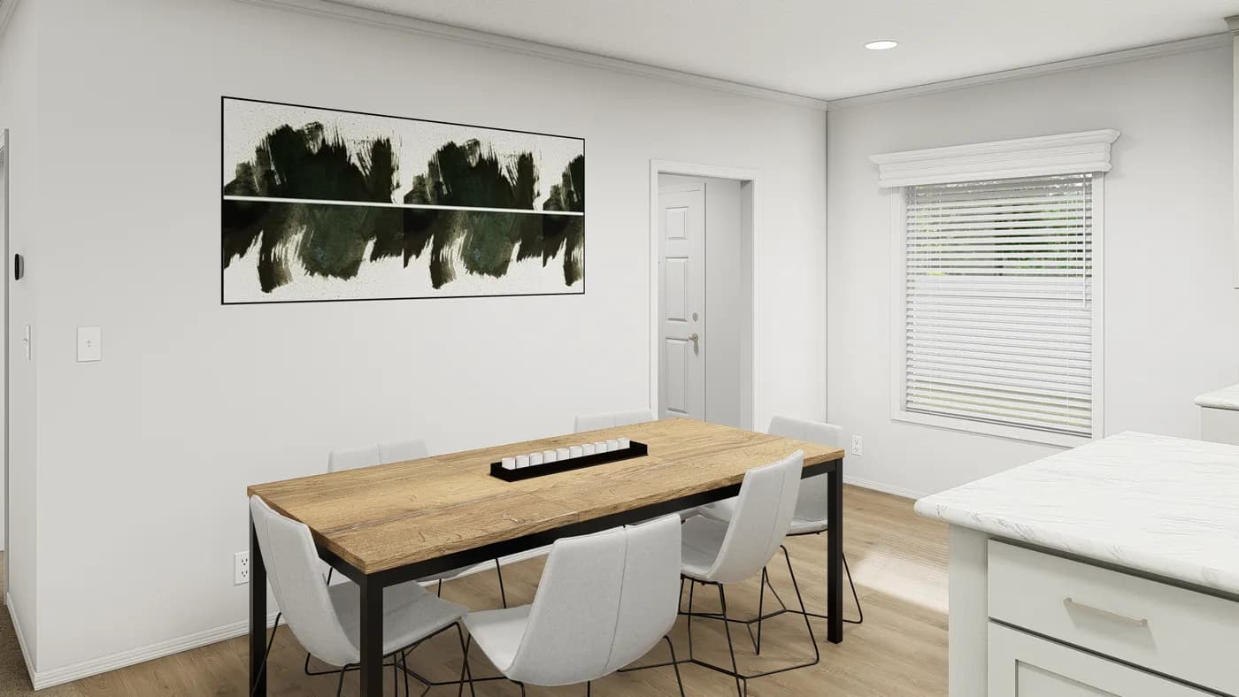 The TU3068A Dining Room. This Manufactured Mobile Home features 4 bedrooms and 2 baths.