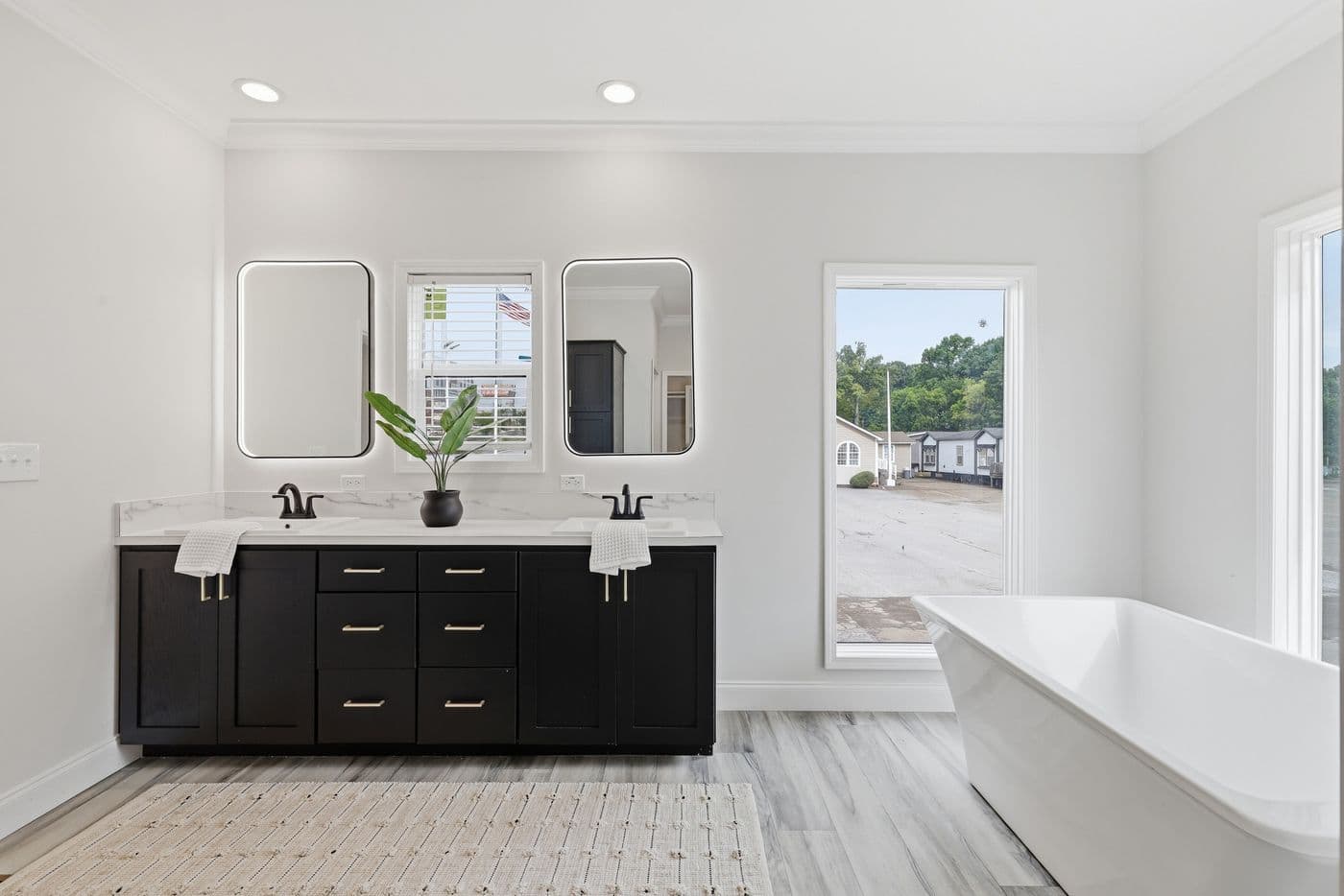 The THE SUMMIT Primary Bathroom. This Manufactured Mobile Home features 3 bedrooms and 2 baths.