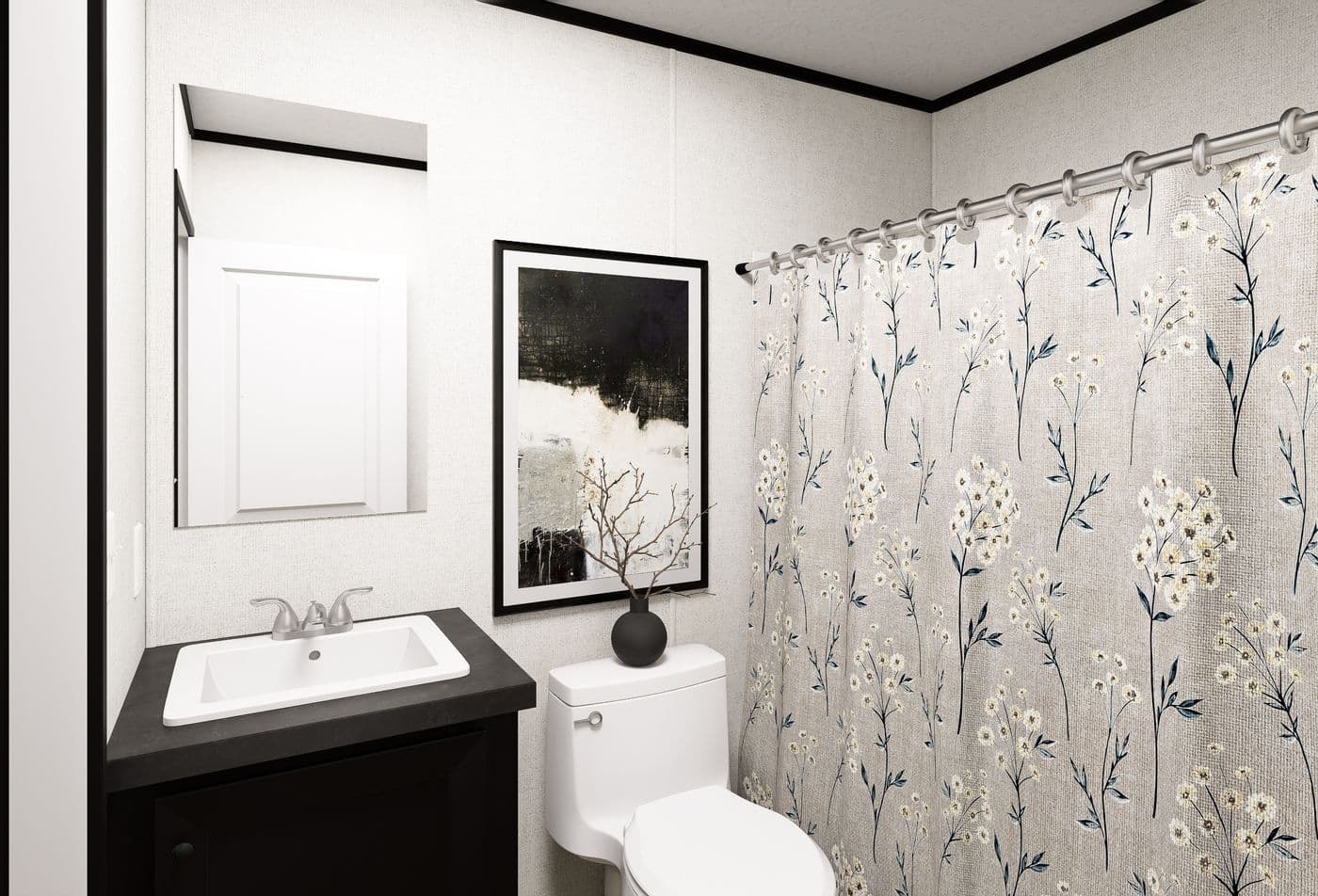 The OASIS Guest Bathroom. This Manufactured Mobile Home features 3 bedrooms and 2 baths.
