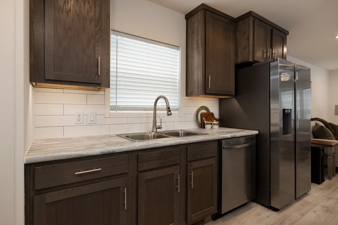 The RAMSEY 217-1 Kitchen. This Manufactured Mobile Home features 3 bedrooms and 2 baths.