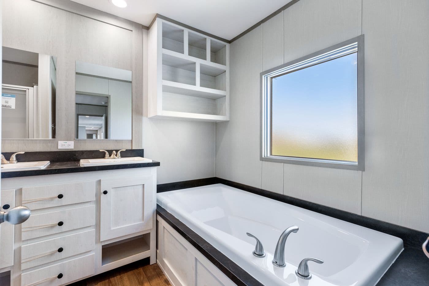 The RESOLUTION 16763K Primary Bathroom. This Manufactured Mobile Home features 3 bedrooms and 2 baths.