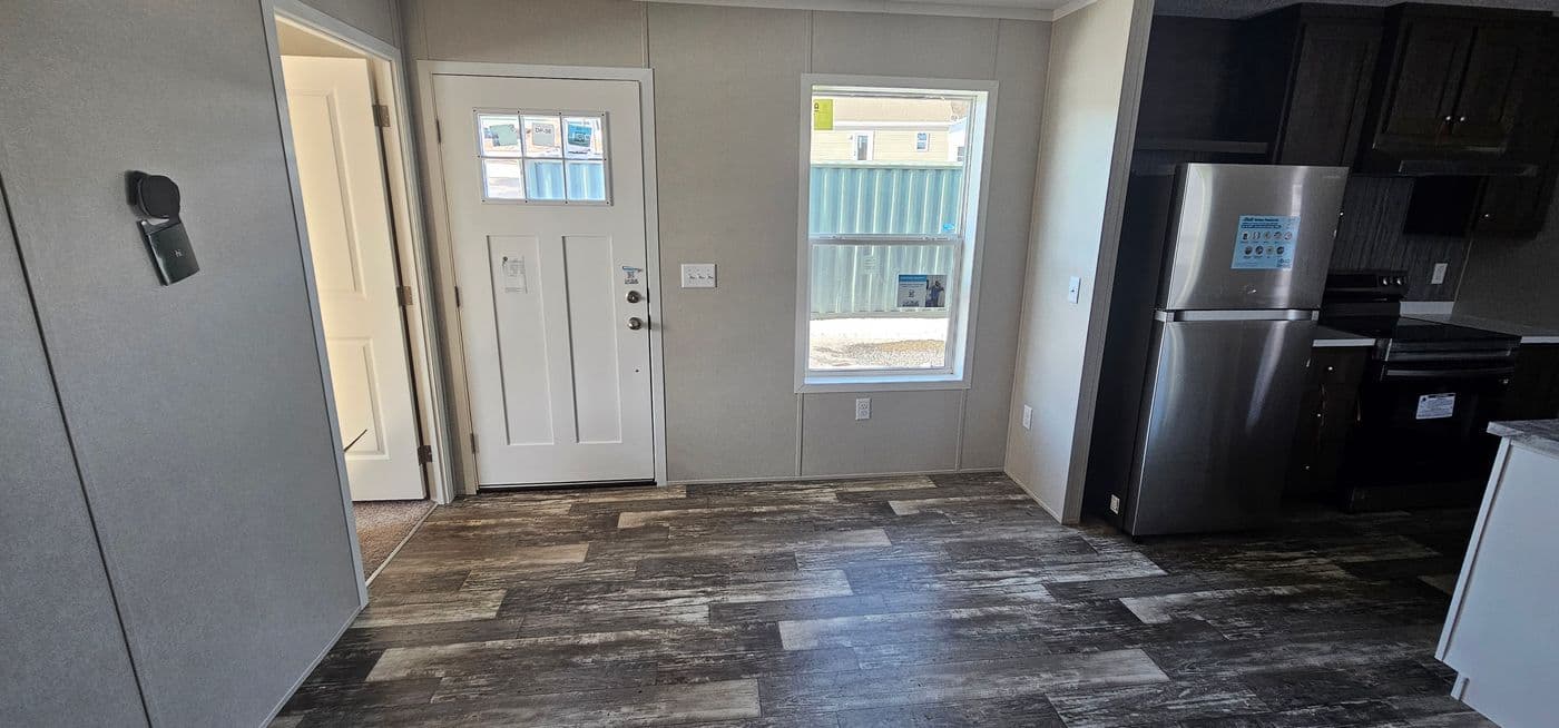 The ONYX 48 Living Room. This Manufactured Mobile Home features 2 bedrooms and 1 bath.