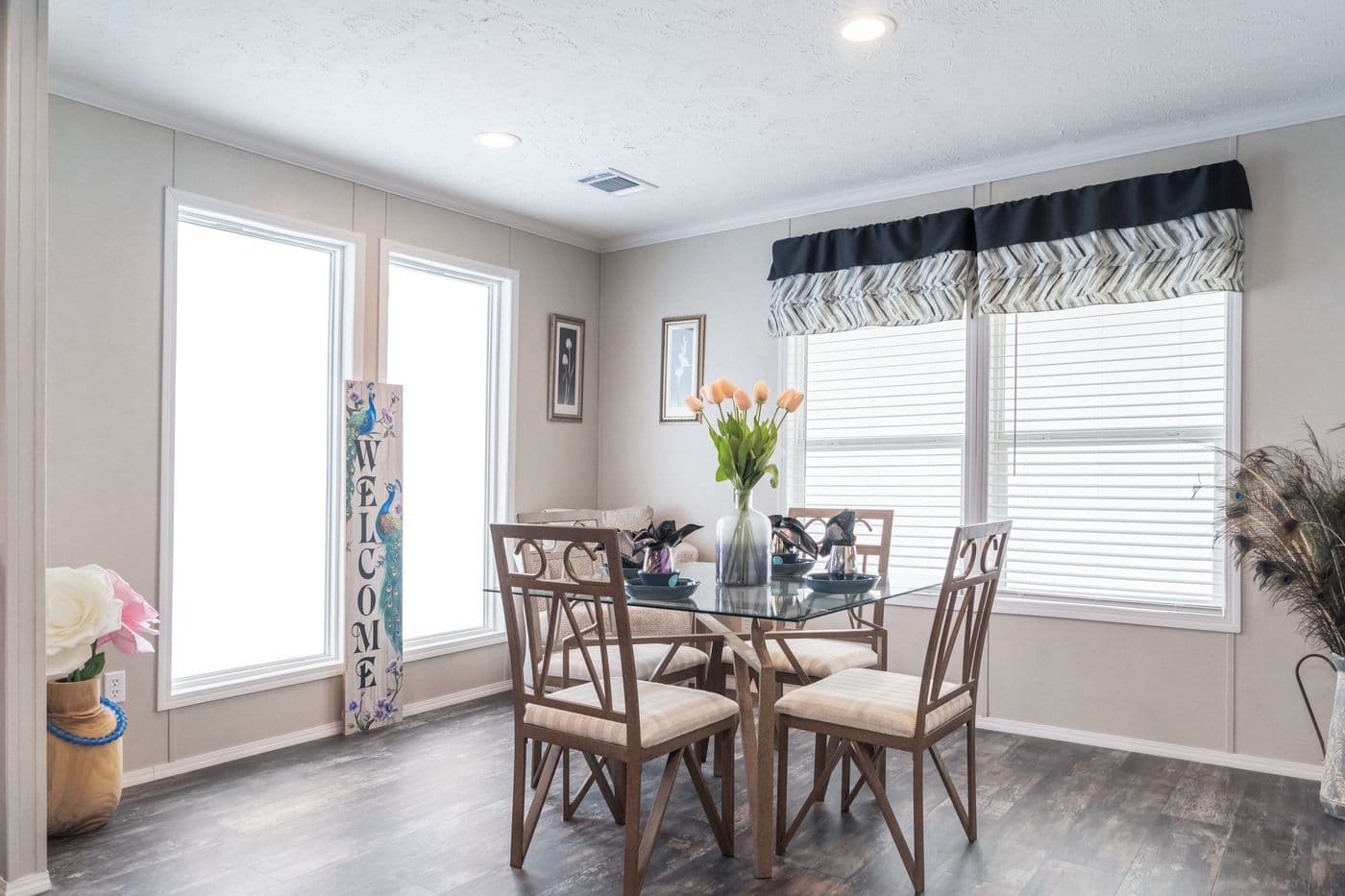 The ALL AMERICAN Dining Room. This Manufactured Mobile Home features 3 bedrooms and 2 baths.