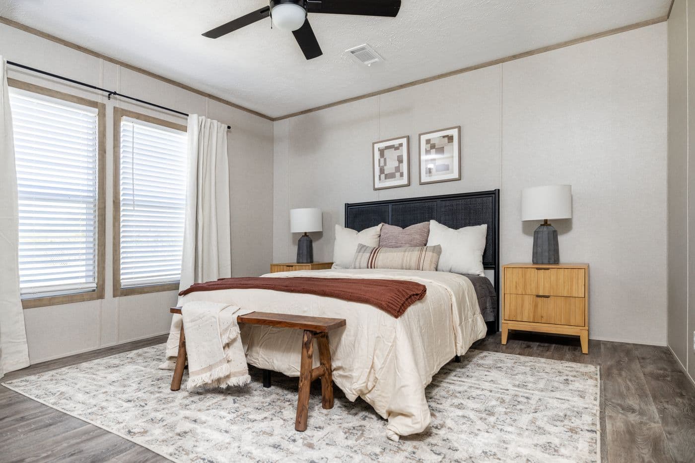 The STERLING ANNIVERSARY Primary Bedroom. This Manufactured Mobile Home features 3 bedrooms and 2 baths.