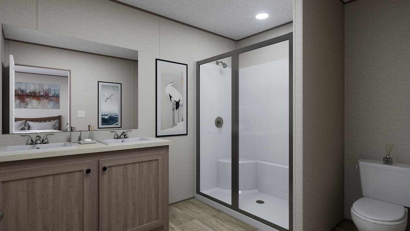 The FOOTHILLS 72 Primary Bathroom. This Manufactured Mobile Home features 3 bedrooms and 2 baths.