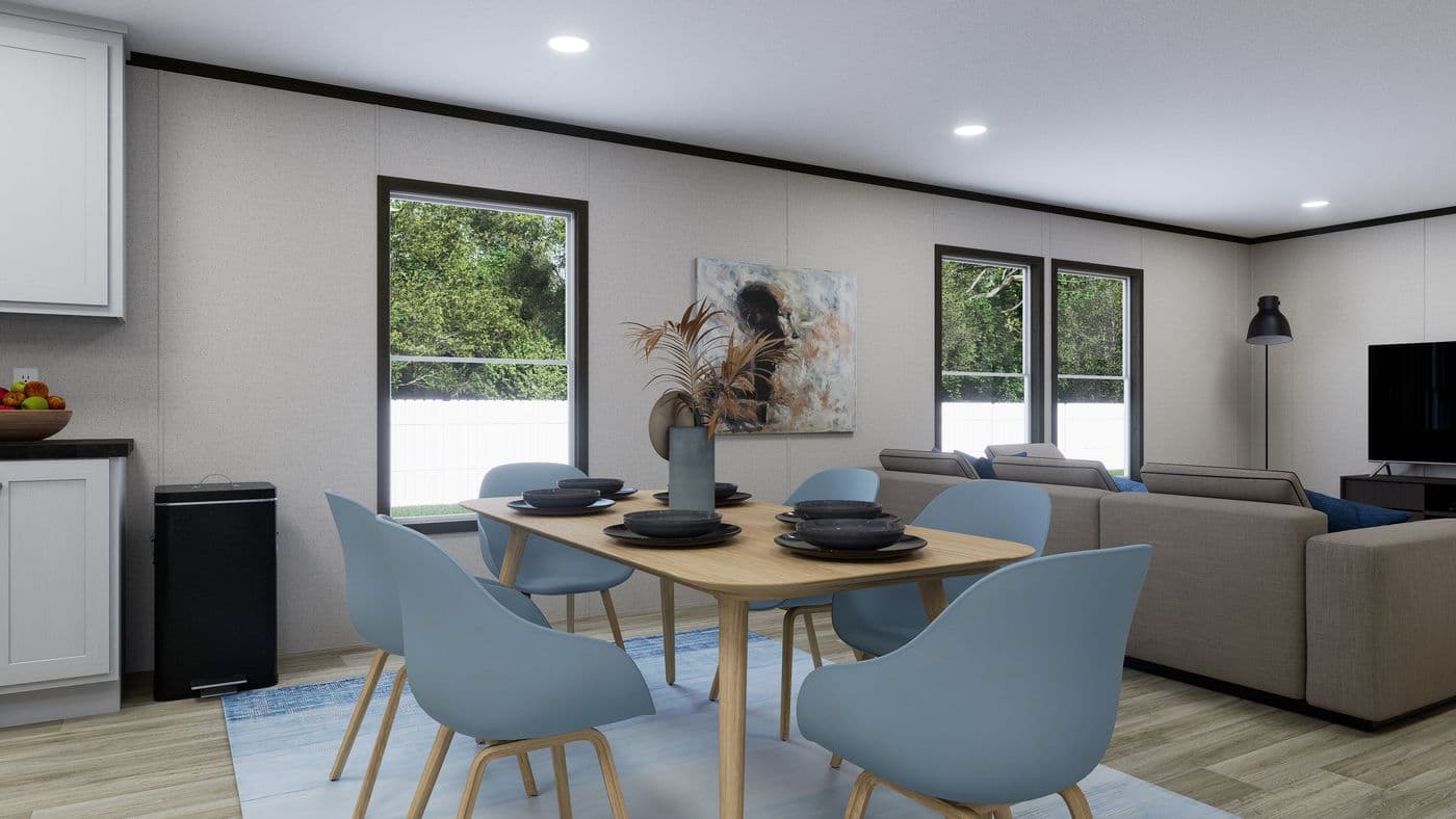 The VENTURE Dining Area. This Manufactured Mobile Home features 4 bedrooms and 2 baths.