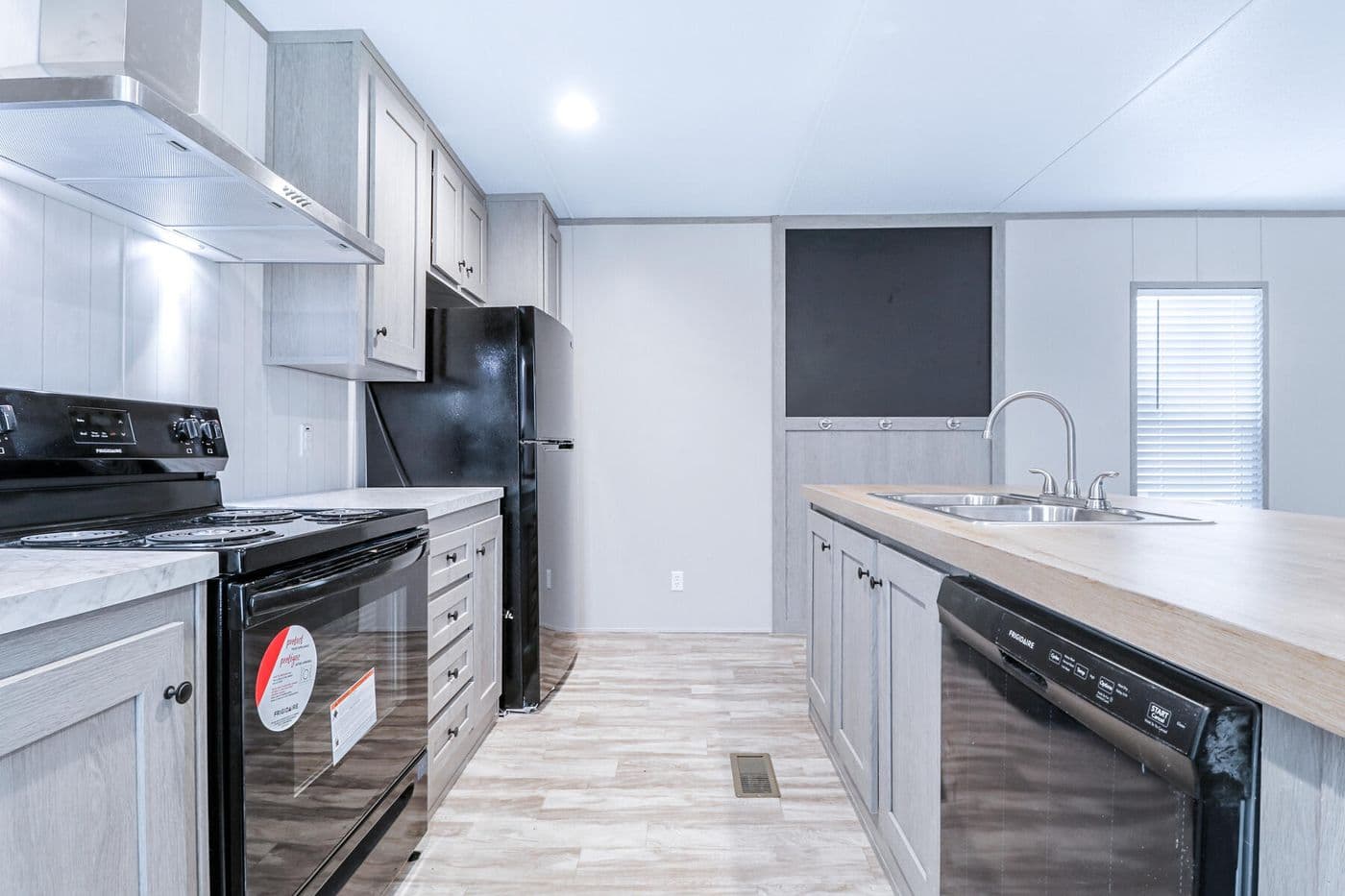 The BREEZE 16723A Exterior. This Manufactured Mobile Home features 3 bedrooms and 2 baths.