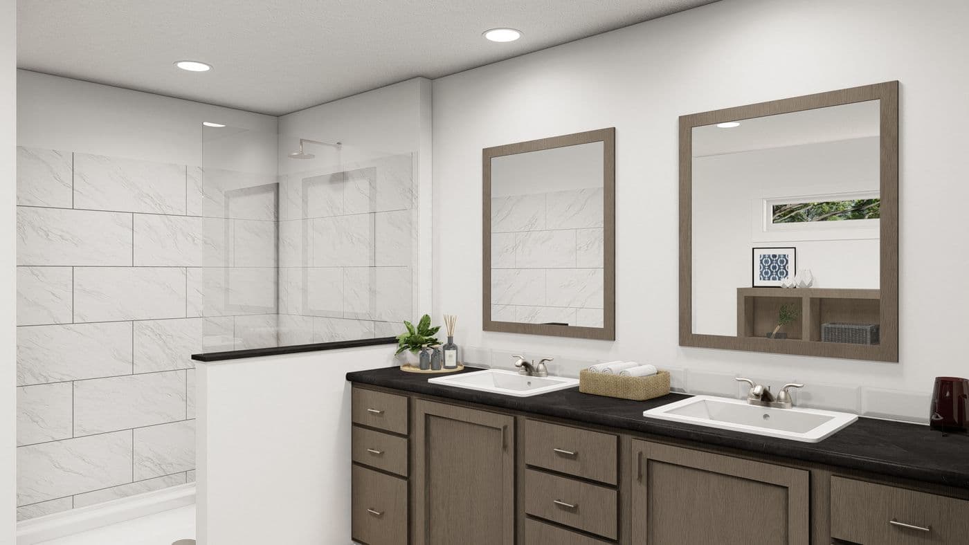 The THE WASHINGTON Primary Bathroom. This Manufactured Mobile Home features 3 bedrooms and 2 baths.
