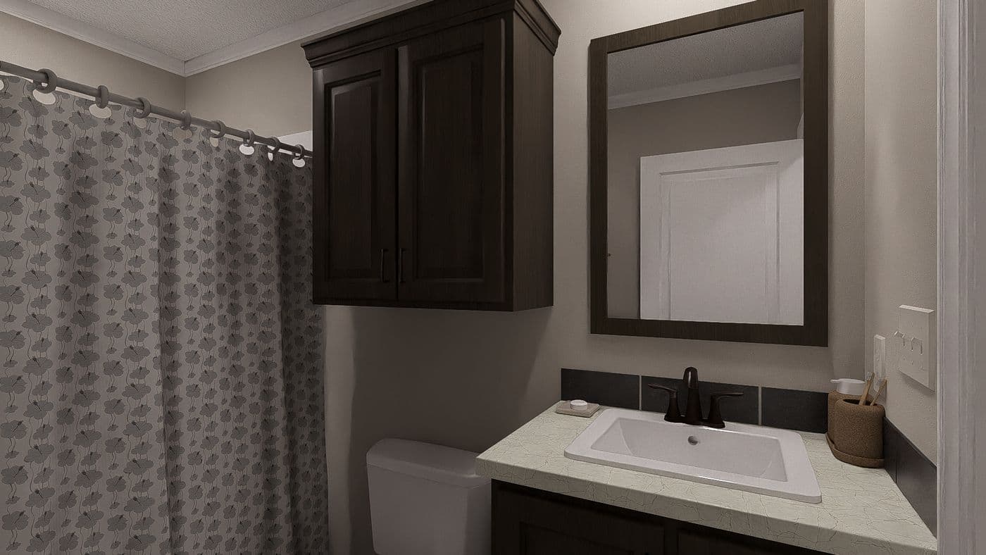 The THE LIL' EASY Guest Bathroom. This Manufactured Mobile Home features 3 bedrooms and 2 baths.
