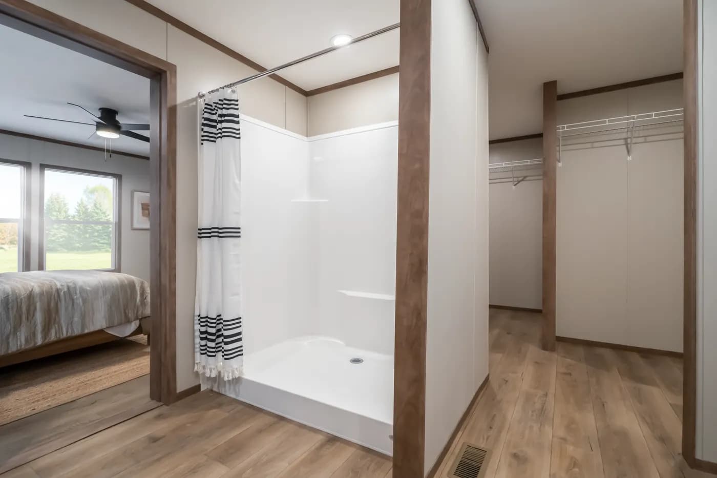 The SEVIER Primary Bathroom. This Manufactured Mobile Home features 4 bedrooms and 3 baths.