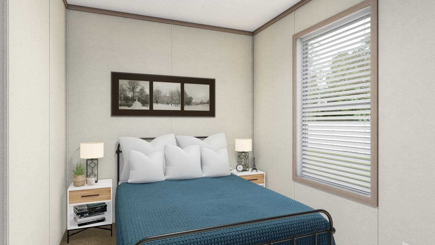 The 7616-4710 THE PULSE Guest Bedroom. This Manufactured Mobile Home features 3 bedrooms and 2 baths.