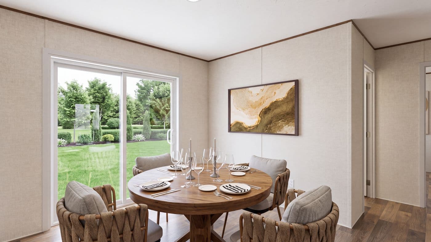 The SPRUCE Dining Area. This Manufactured Mobile Home features 3 bedrooms and 2 baths.