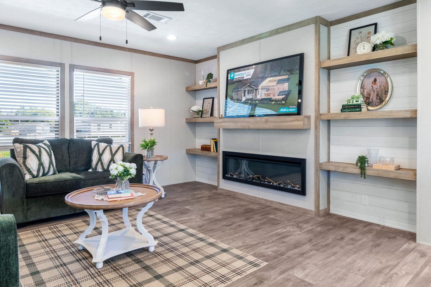 The THE BIG DEAL 52 Living Room. This Manufactured Mobile Home features 3 bedrooms and 2 baths.